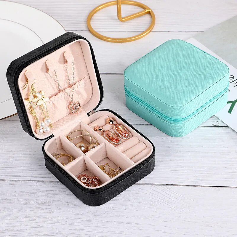 Double-Layer PU Leather Jewelry Box - Travel Organizer for Earrings & Accessories.