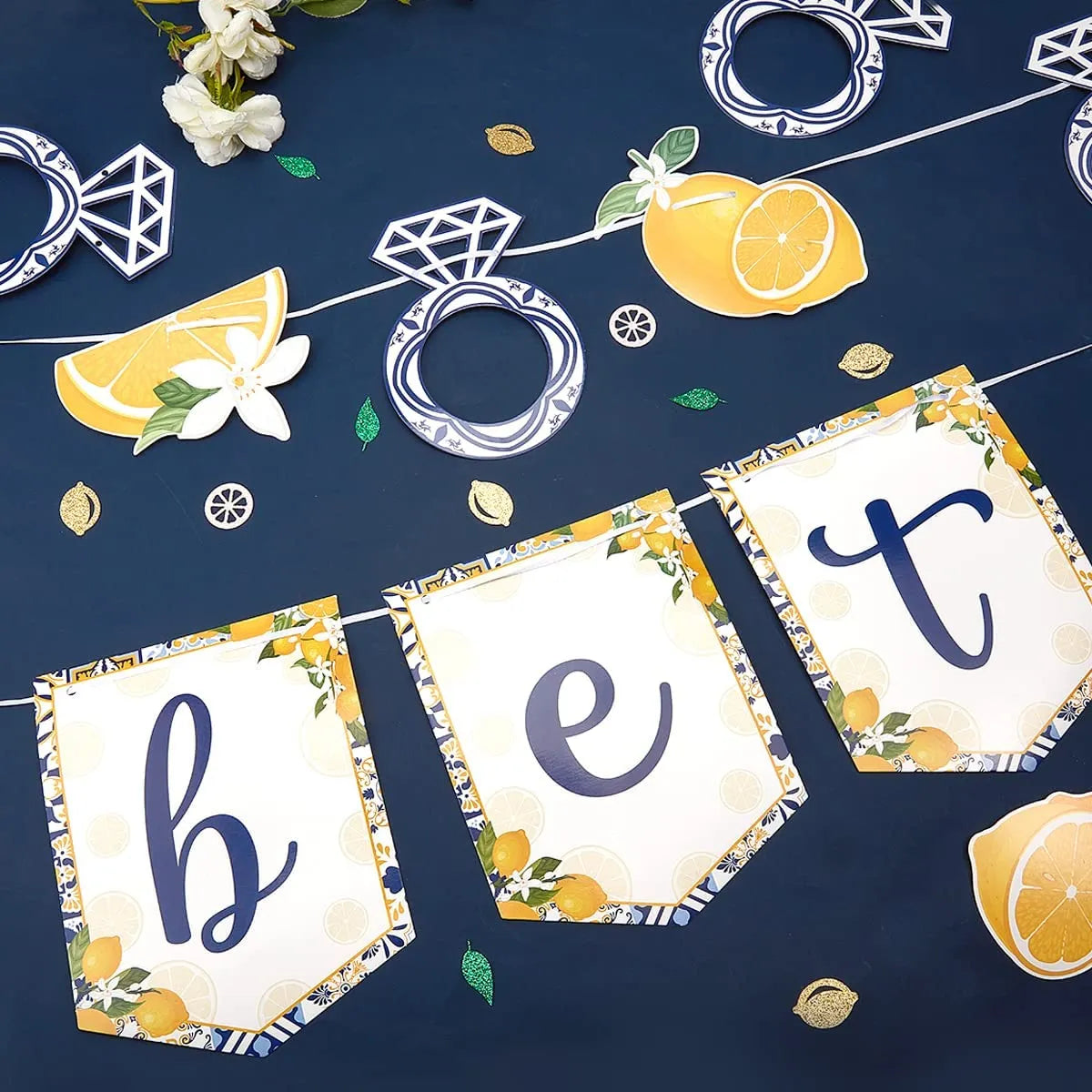 Lemon Bridal Shower Decor: Yellow & Blue Banner with Diamond Ring Garland.