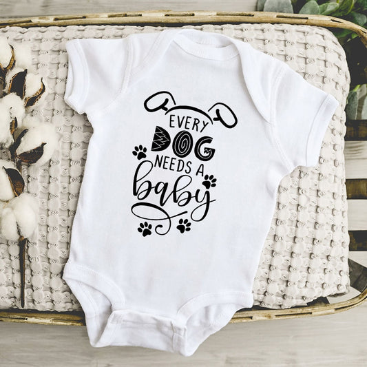 Every Dog Needs A Baby Newborn Bodysuit - Infant Romper, Cute Kids Playsuit, Baby Gift.